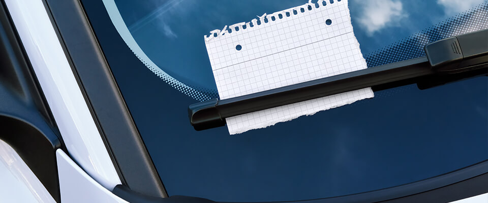 Note left behind windscreen wiper